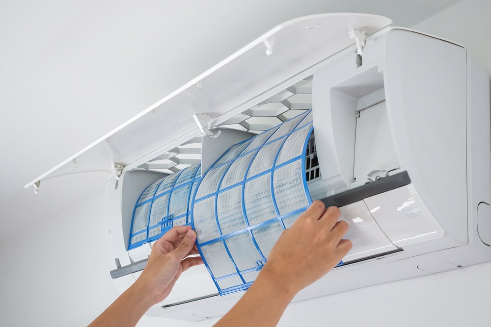 man hand hold air conditioner filter cleaning concept - hvac new orleans